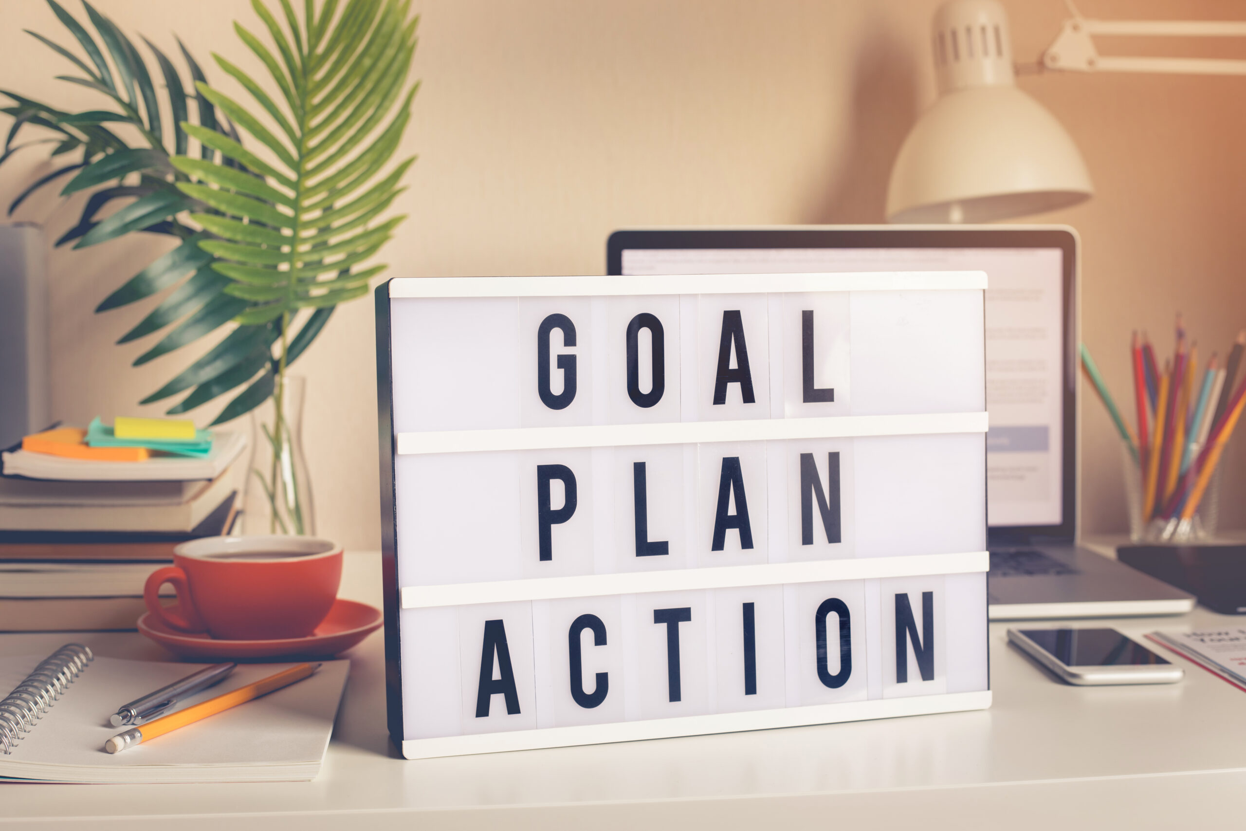 Image that reads the words goal, plan and action on peach background and white board. Image of episode about change of attitude and enduring with Richard Lane MD, Ph.D., Gay Hendricks, & Carol Kline
