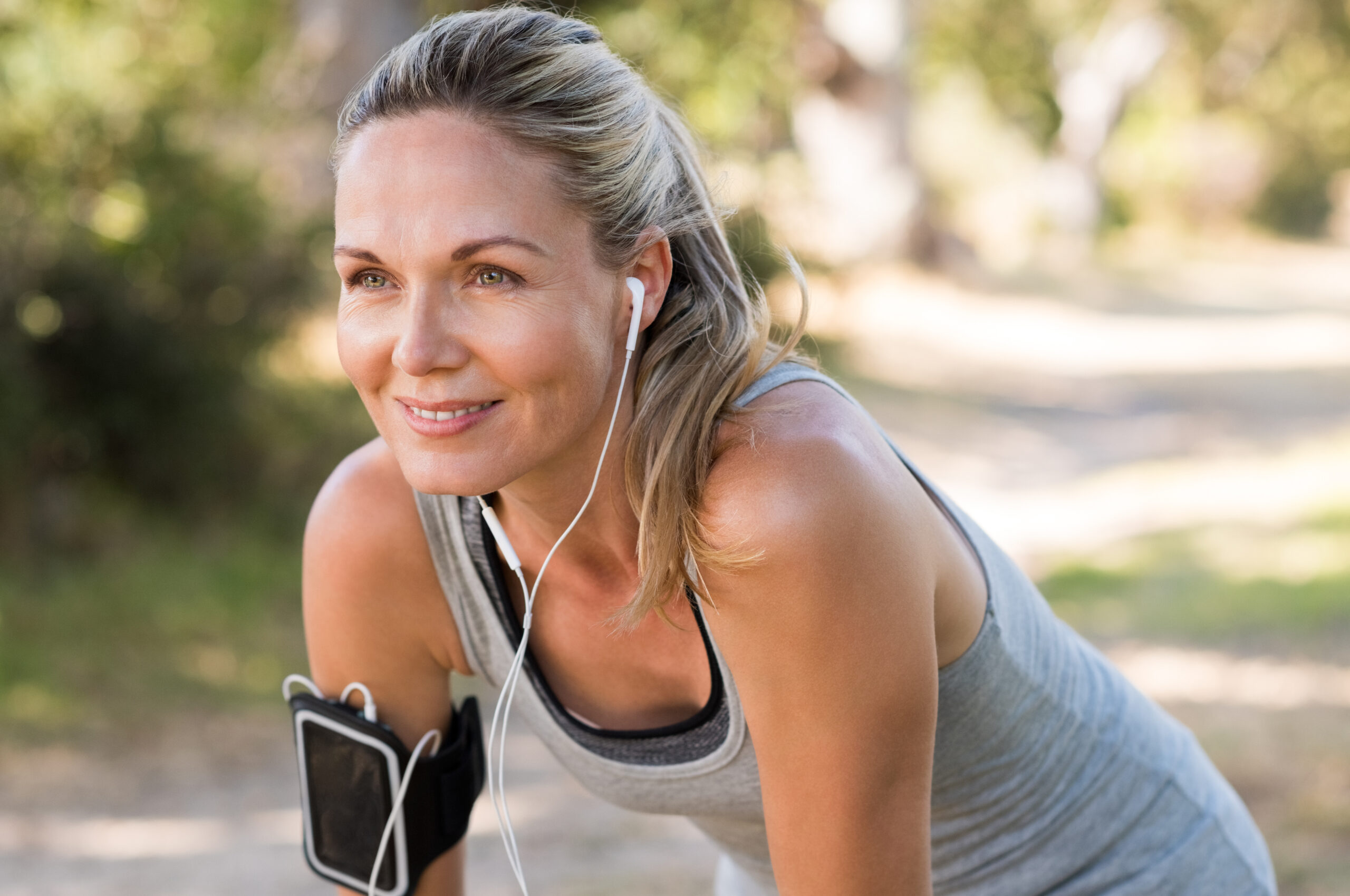 Woman doing exercise and moving her body, podcast episode called Exercise the Wonder Drug: Move the Body, Heal The Brain with Dr. Jennifer Heisz & Caroline Williams.